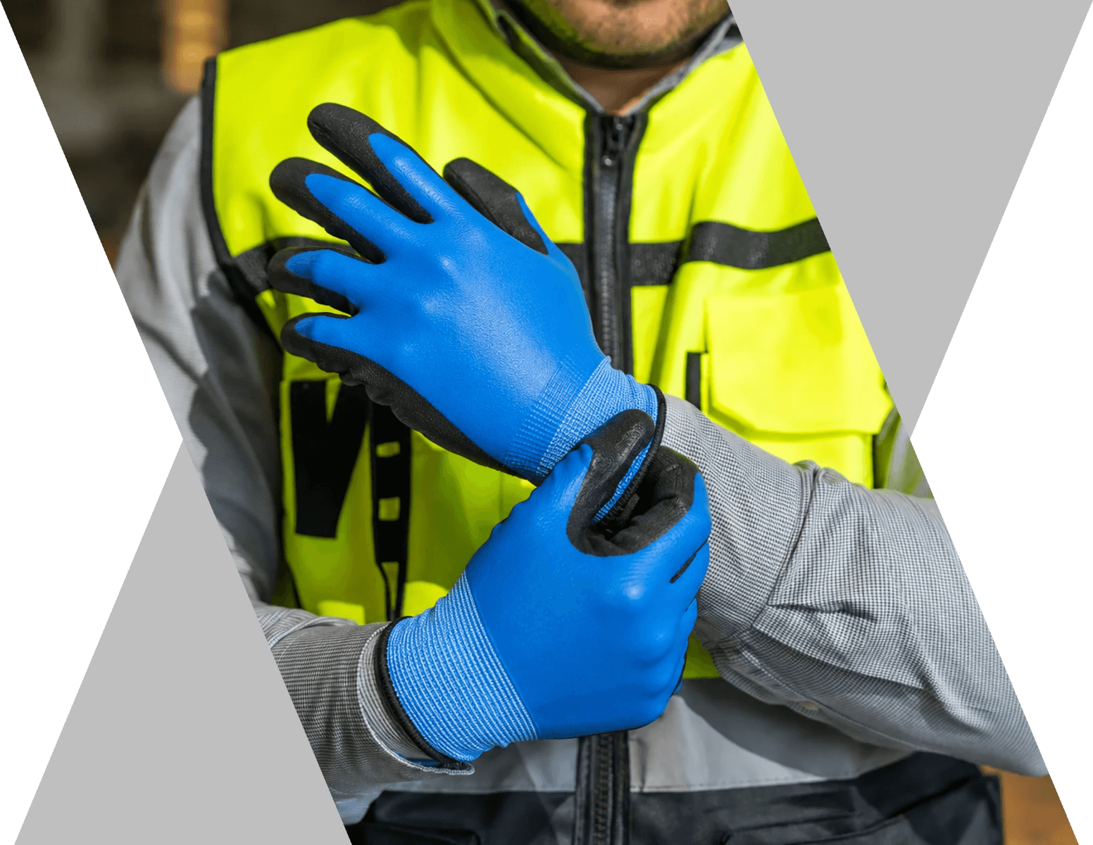 Worker wearing blue protective work gloves