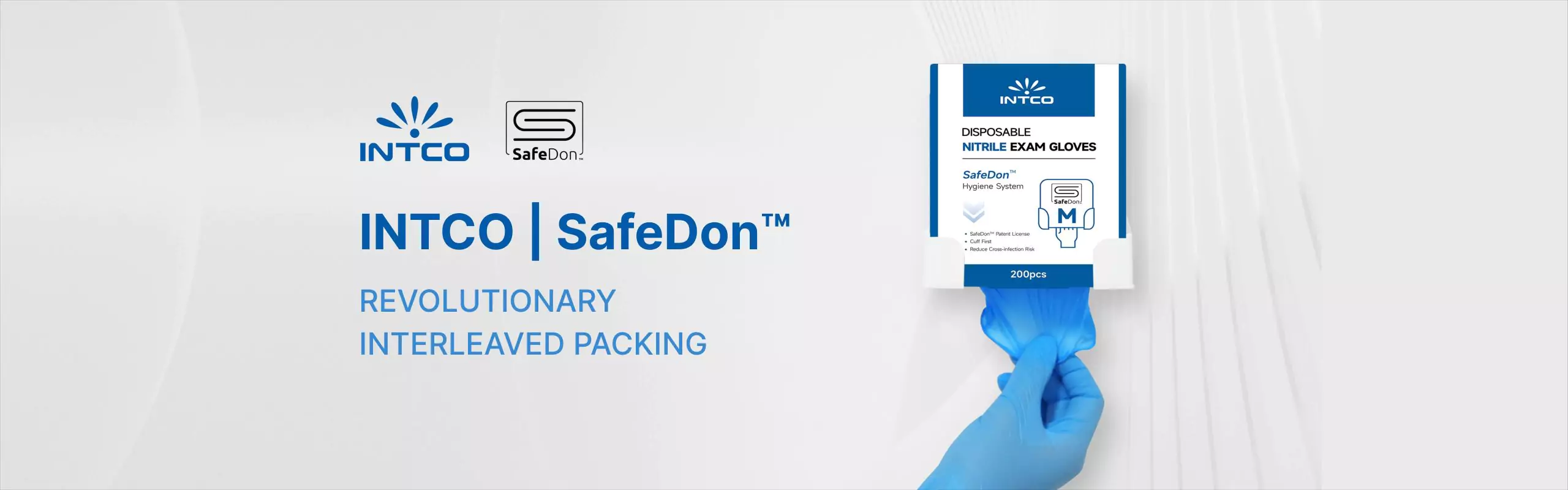 Safedon nitrile gloves being pulled from pack
