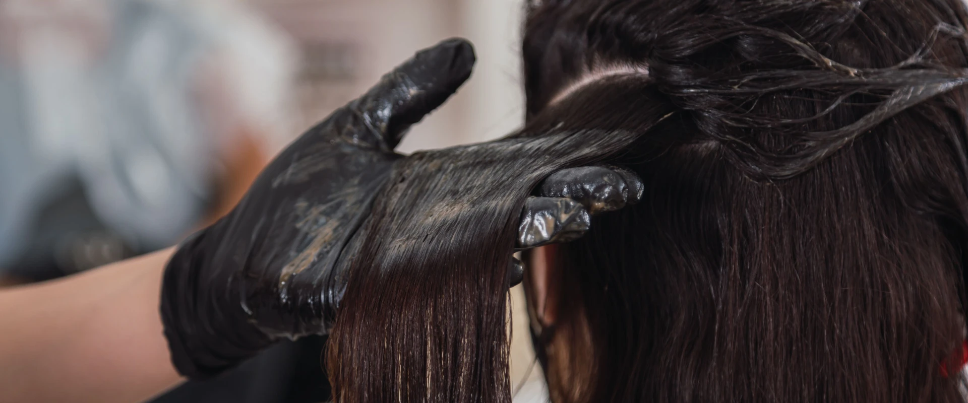 INTCO Nitrile Gloves used for hair dyeing in a salon setting