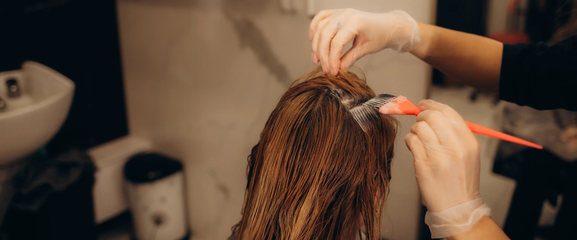 Vinyl gloves for hair coloring in a salon, ensuring cleanliness and protection.